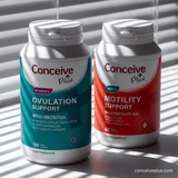 Two Conceive Plus supplement bottles on a light background
