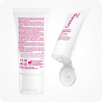 Image of two tubes of Conceive Plus try me size fertility lubricant 30ml on a white background. One tube has its lid open and the other ones shows backside with information about its application in different languages. The tubes are white with pink branding.